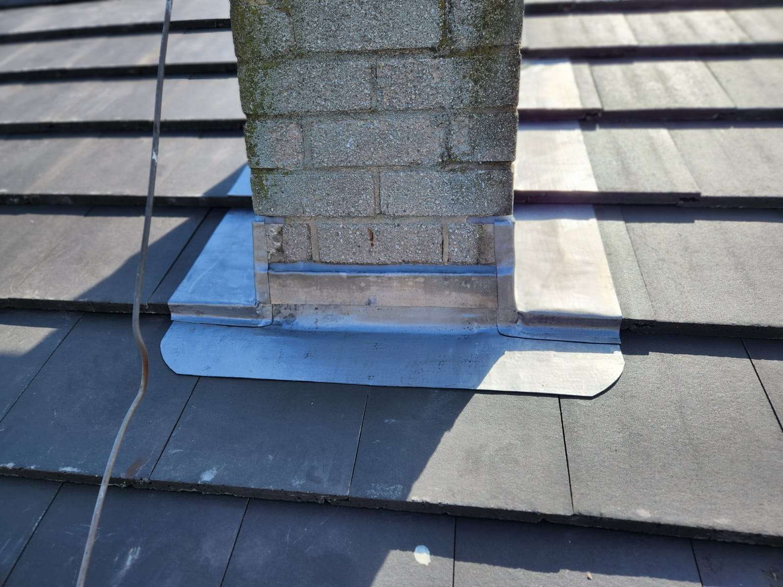Chimney lead flashing repair on a roof in St Helens