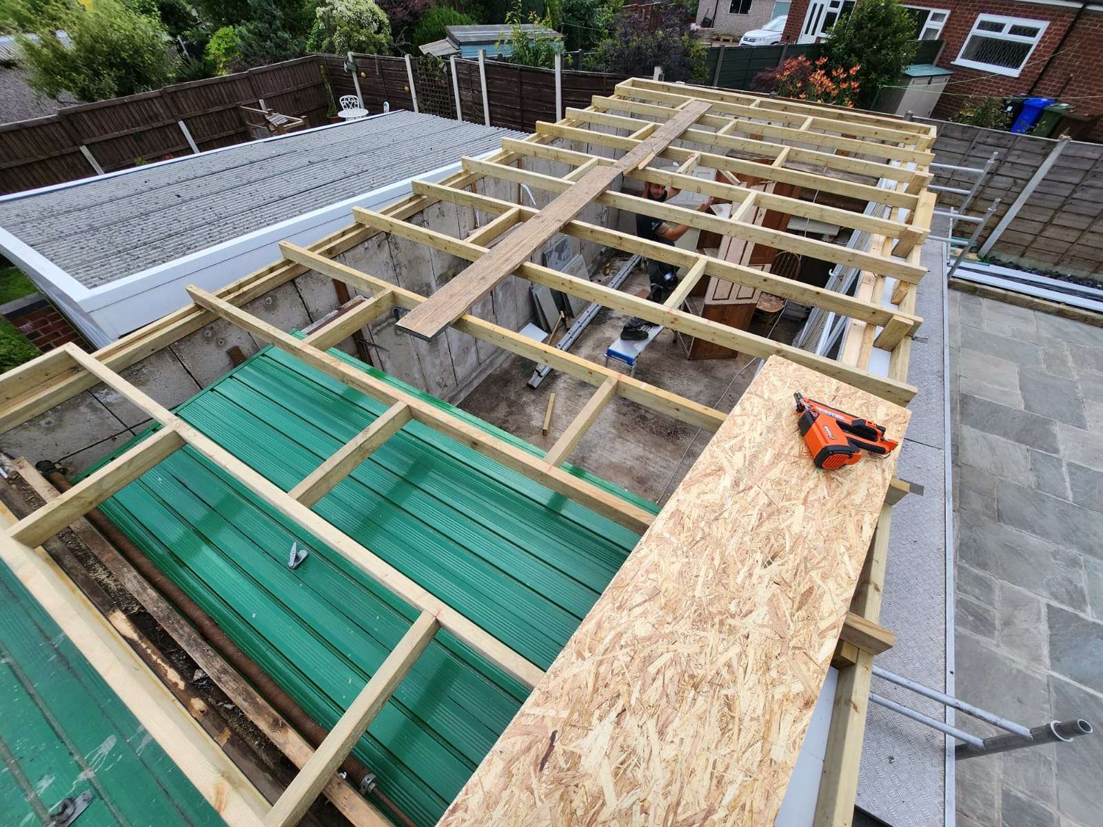 Roof replacement in Bolton with the old covering stripped back to new battens and breathable underlay